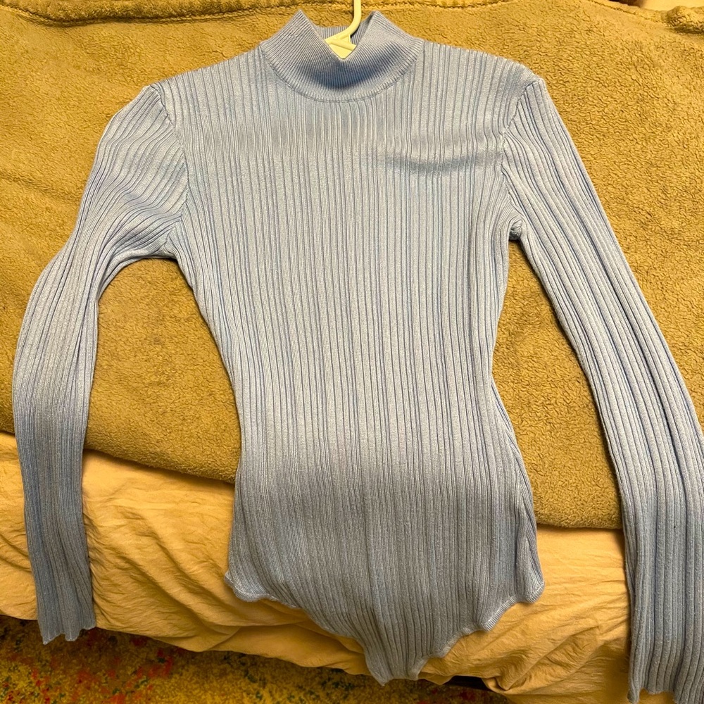 Light blue turtleneck body suit